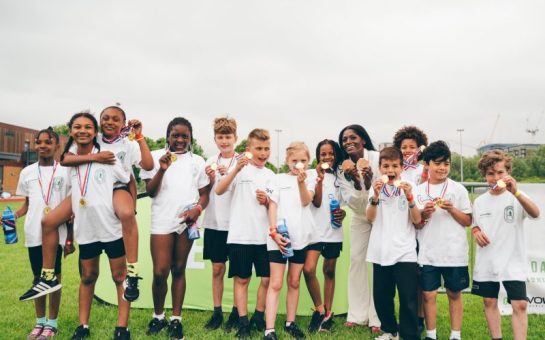 Children compete in community sports day alongside GB sprinter
