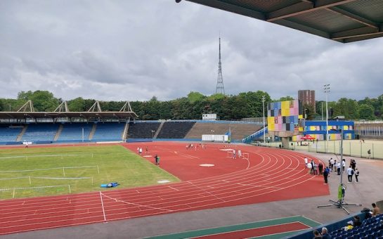 Athletics track at Crystal Palace athletics stadium with transmitting station in background