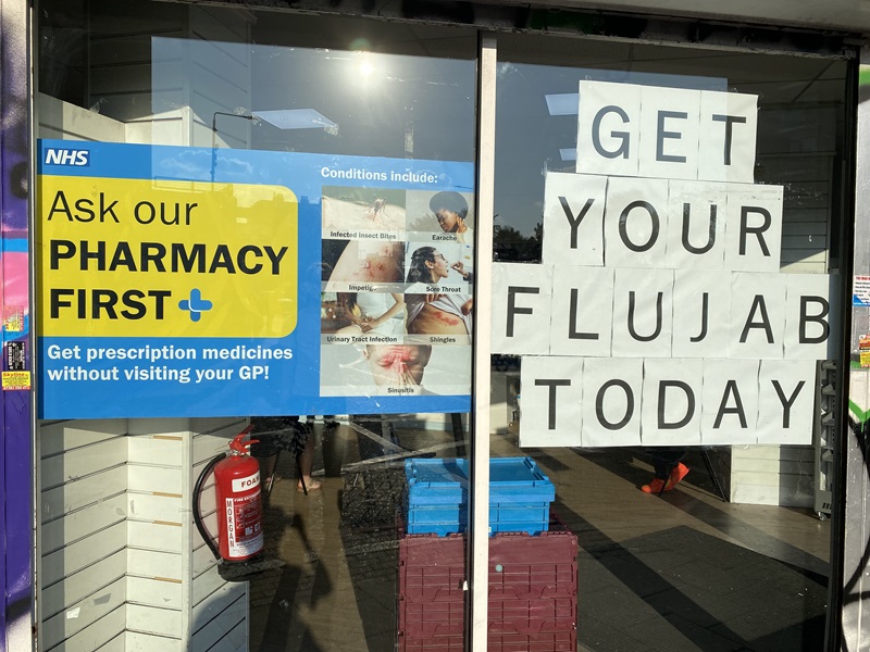 Pharmacist window, advertising Pharmacy First