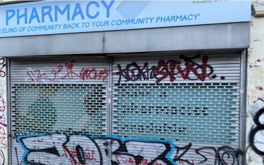 The exterior of a closed pharmacy in Peckham