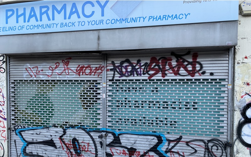 The exterior of a closed pharmacy in Peckham