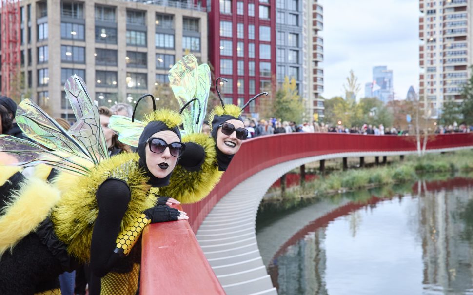 Performers dressed as bees on Asif Khan's new boardwalk at Canada Water