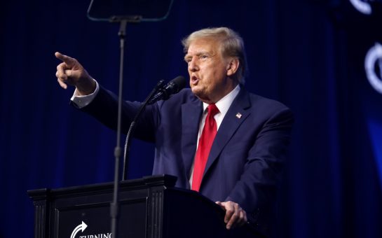 Donald Trump speaking with attendees at The People's Convention at Huntington Place in Detroit, Michigan.