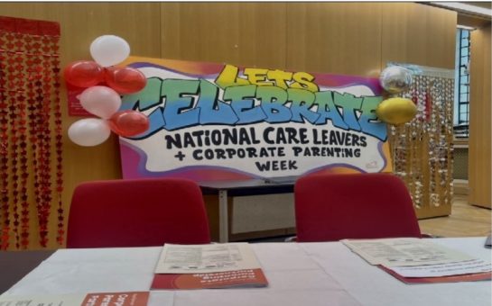 2023 National Care Leaver's Week display, featuring a banner bordered with red and white balloons.